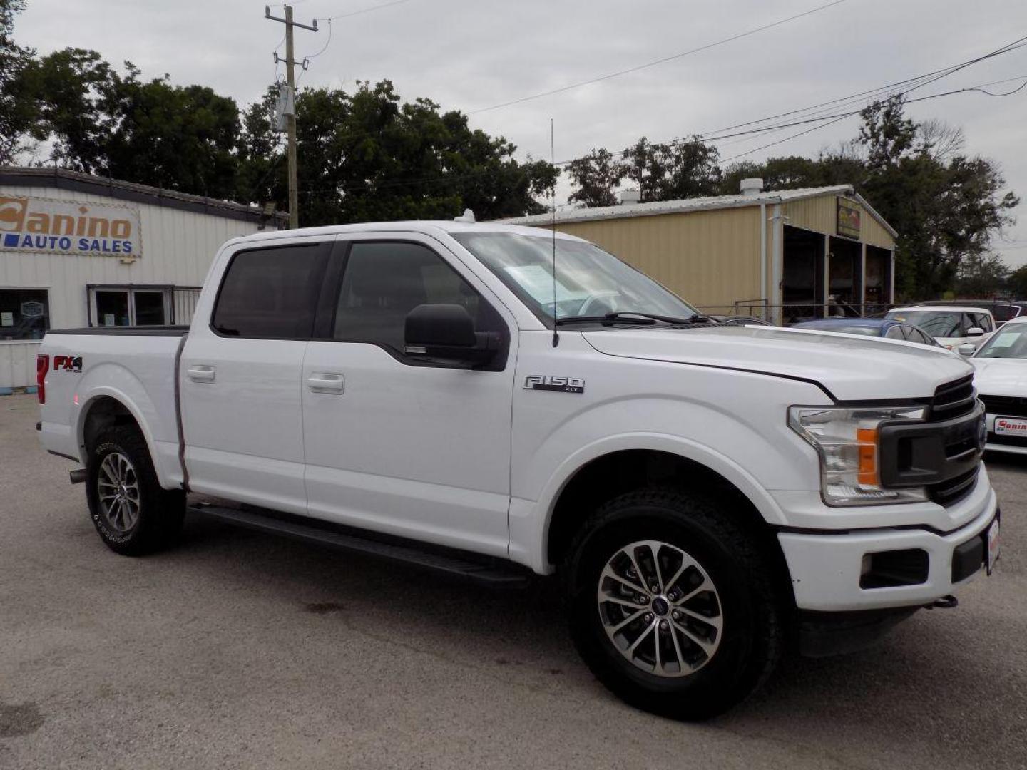 2018 WHITE FORD F150 SUPERCREW (1FTEW1EP9JK) with an 2.7L engine, Automatic transmission, located at 830 E. Canino Rd., Houston, TX, 77037, (281) 405-0440, 38.358219, -81.729942 - Photo#7
