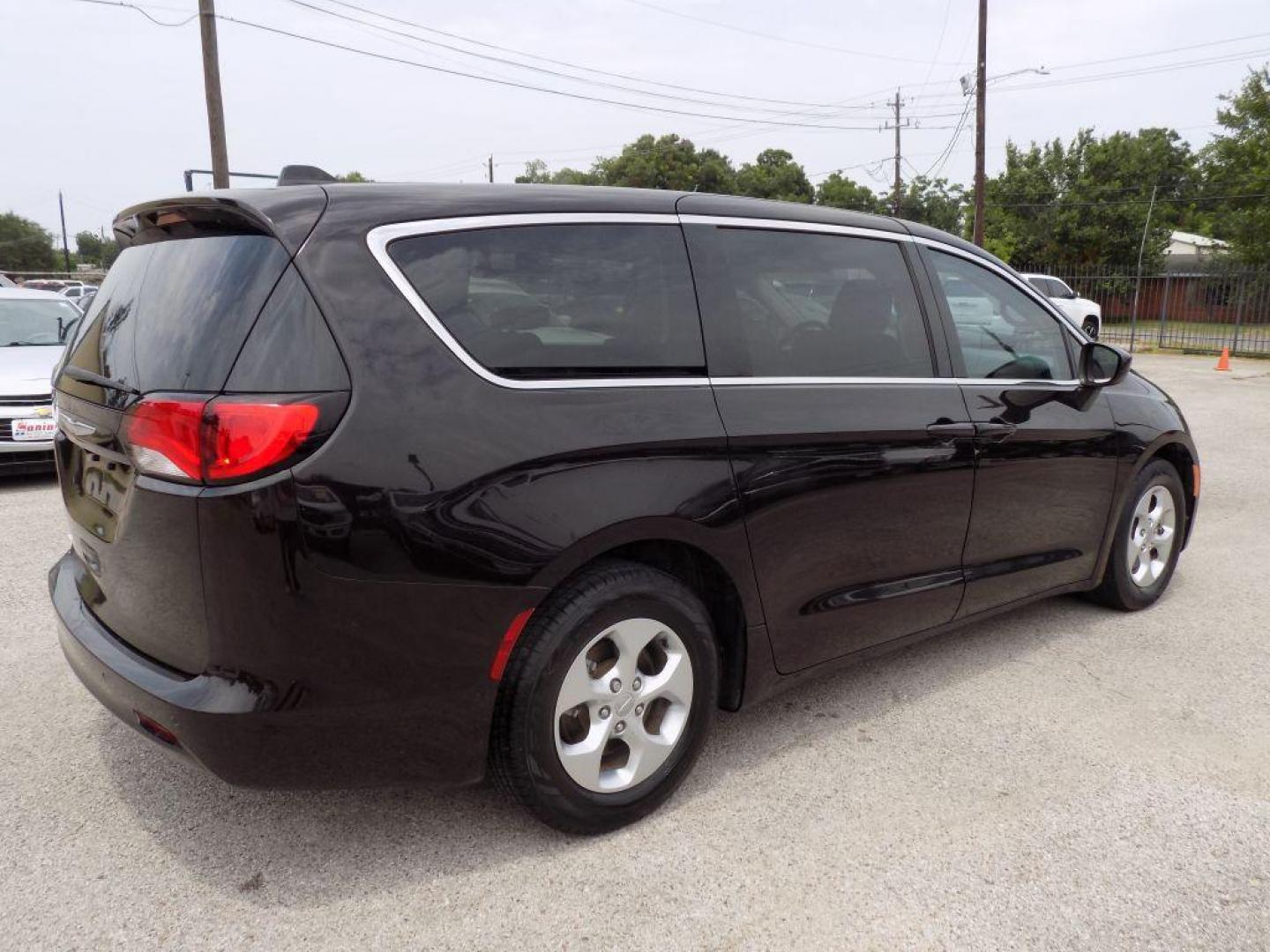 2017 BLACK CHRYSLER PACIFICA LX (2C4RC1CG1HR) with an 3.6L engine, Automatic transmission, located at 830 E. Canino Rd., Houston, TX, 77037, (281) 405-0440, 38.358219, -81.729942 - Photo#5