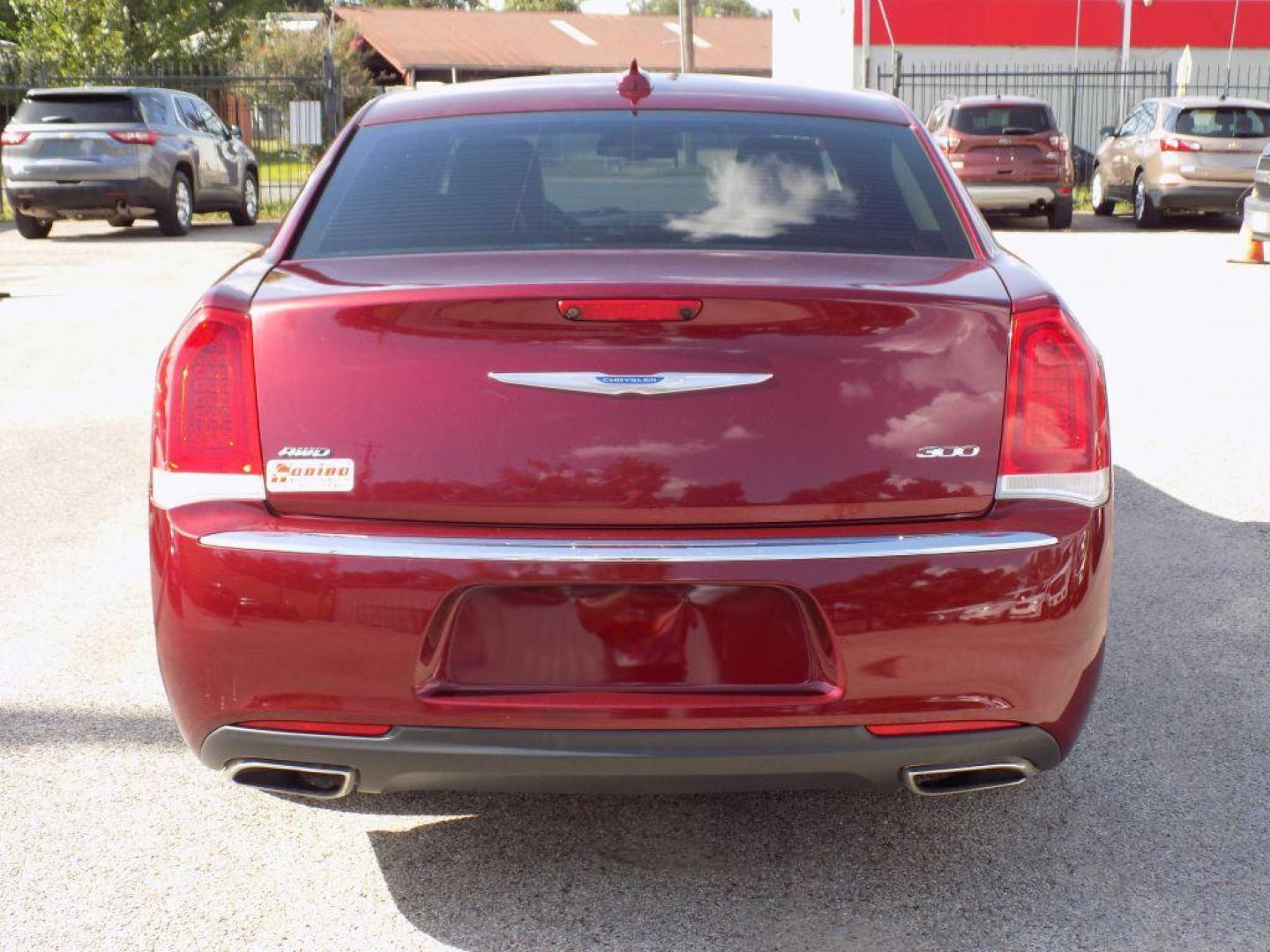 2019 RED CHRYSLER 300 LIMITED (2C3CCAKG2KH) with an 3.6L engine, Automatic transmission, located at 830 E. Canino Rd., Houston, TX, 77037, (281) 405-0440, 38.358219, -81.729942 - Photo#4