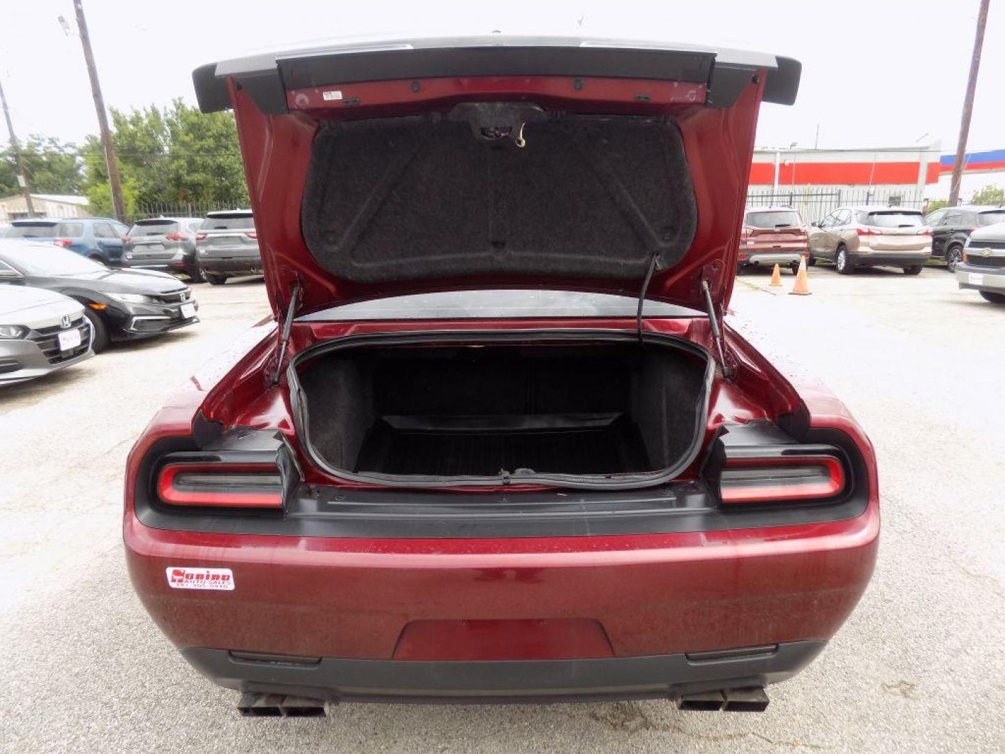 2021 MAROON DODGE CHALLENGER SXT (2C3CDZAG0MH) with an 3.6L engine, Automatic transmission, located at 830 E. Canino Rd., Houston, TX, 77037, (281) 405-0440, 38.358219, -81.729942 - Photo#11