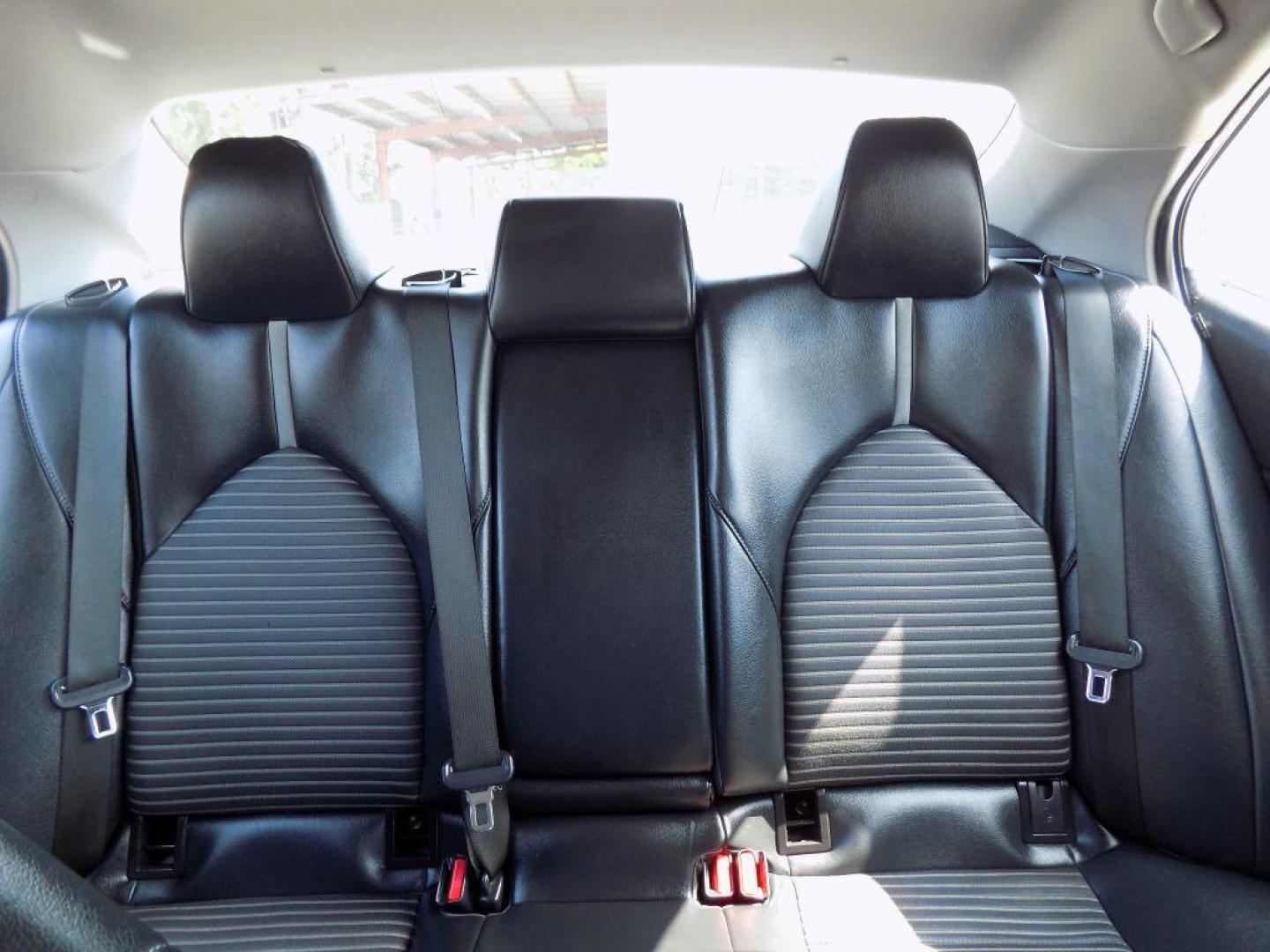 2021 SILVER TOYOTA CAMRY SE (4T1G11AK8MU) with an 2.5L engine, Automatic transmission, located at 830 E. Canino Rd., Houston, TX, 77037, (281) 405-0440, 38.358219, -81.729942 - Photo#22
