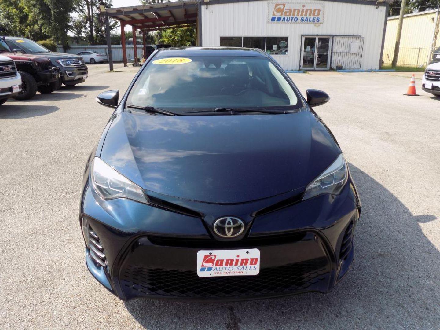 2018 BLUE TOYOTA COROLLA L (5YFBURHEXJP) with an 1.8L engine, Continuously Variable transmission, located at 830 E. Canino Rd., Houston, TX, 77037, (281) 405-0440, 38.358219, -81.729942 - Photo#0