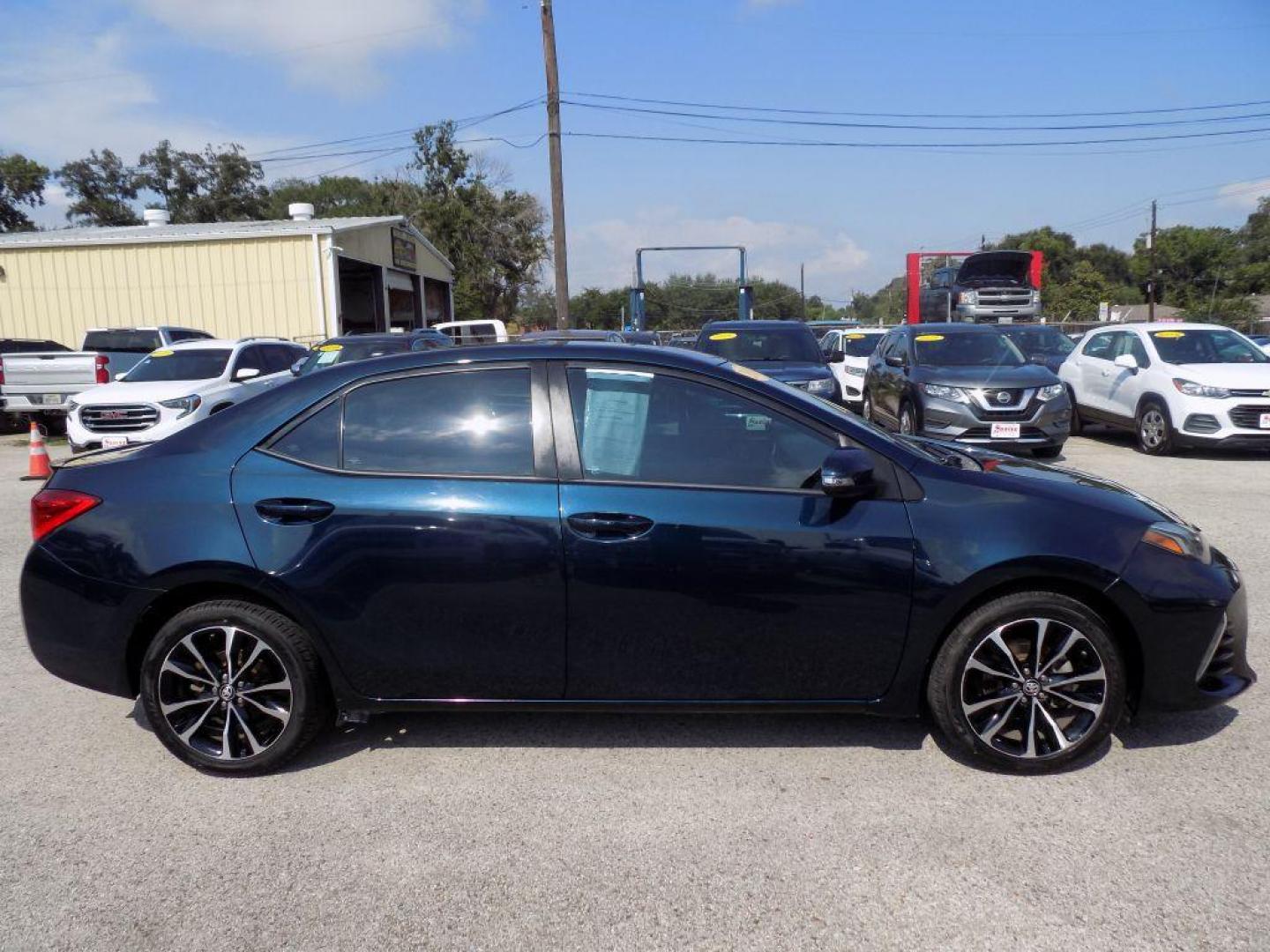 2018 BLUE TOYOTA COROLLA L (5YFBURHEXJP) with an 1.8L engine, Continuously Variable transmission, located at 830 E. Canino Rd., Houston, TX, 77037, (281) 405-0440, 38.358219, -81.729942 - Photo#7