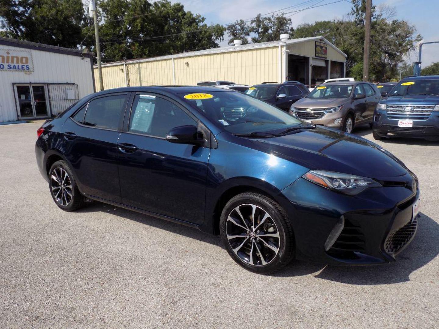 2018 BLUE TOYOTA COROLLA L (5YFBURHEXJP) with an 1.8L engine, Continuously Variable transmission, located at 830 E. Canino Rd., Houston, TX, 77037, (281) 405-0440, 38.358219, -81.729942 - Photo#8