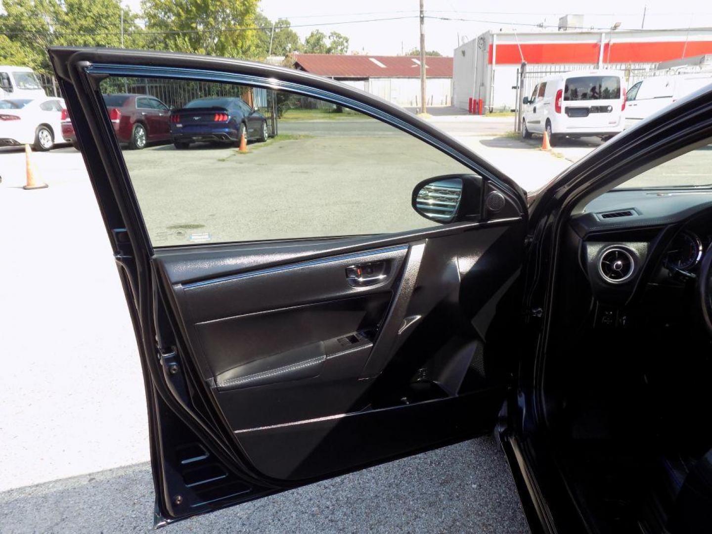 2018 BLUE TOYOTA COROLLA L (5YFBURHEXJP) with an 1.8L engine, Continuously Variable transmission, located at 830 E. Canino Rd., Houston, TX, 77037, (281) 405-0440, 38.358219, -81.729942 - Photo#9