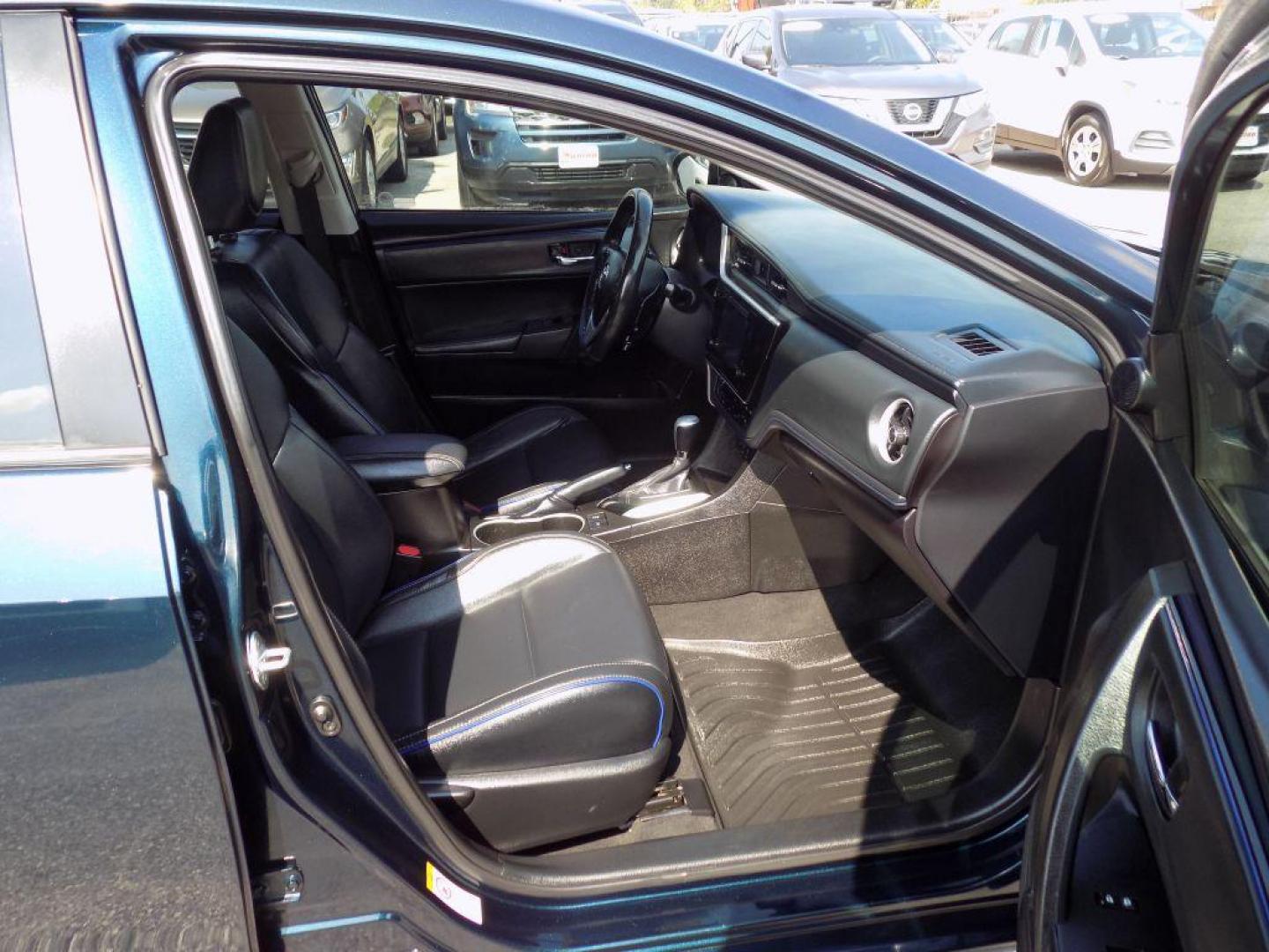 2018 BLUE TOYOTA COROLLA L (5YFBURHEXJP) with an 1.8L engine, Continuously Variable transmission, located at 830 E. Canino Rd., Houston, TX, 77037, (281) 405-0440, 38.358219, -81.729942 - Photo#14