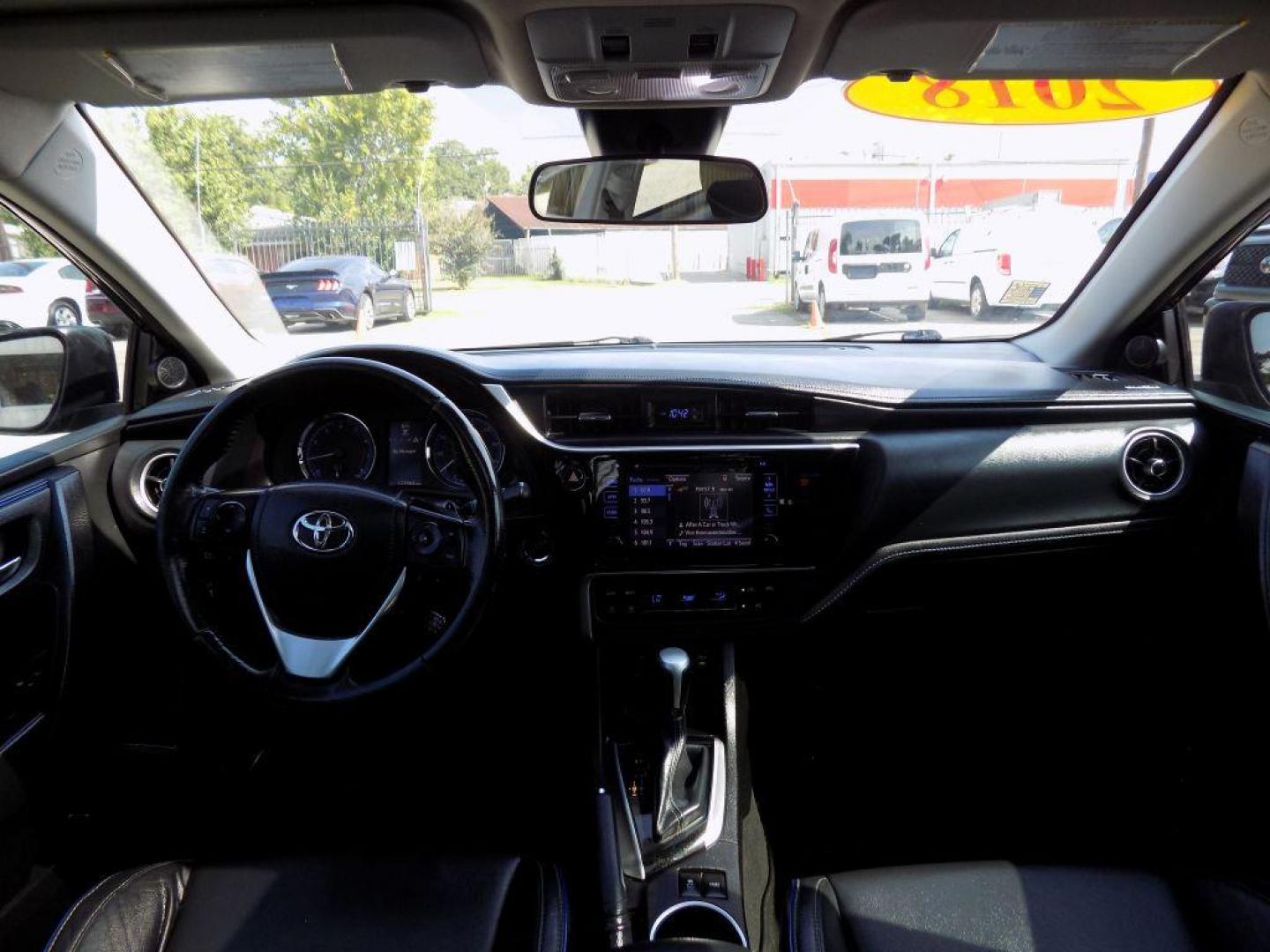 2018 BLUE TOYOTA COROLLA L (5YFBURHEXJP) with an 1.8L engine, Continuously Variable transmission, located at 830 E. Canino Rd., Houston, TX, 77037, (281) 405-0440, 38.358219, -81.729942 - Photo#20