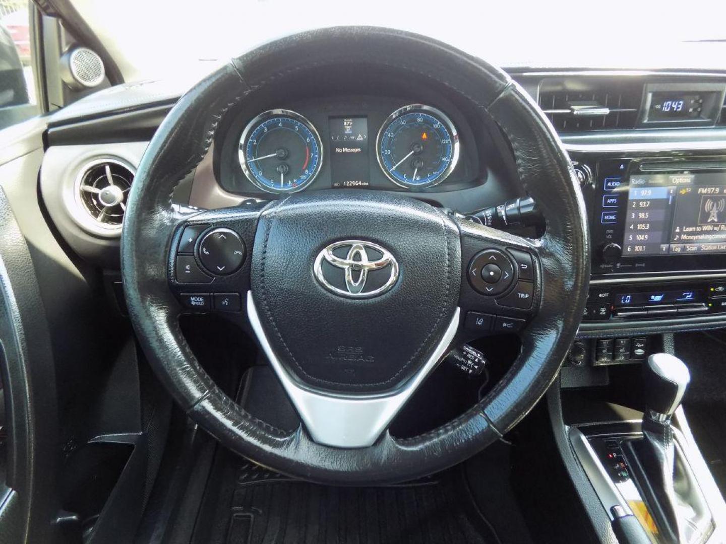 2018 BLUE TOYOTA COROLLA L (5YFBURHEXJP) with an 1.8L engine, Continuously Variable transmission, located at 830 E. Canino Rd., Houston, TX, 77037, (281) 405-0440, 38.358219, -81.729942 - Photo#22