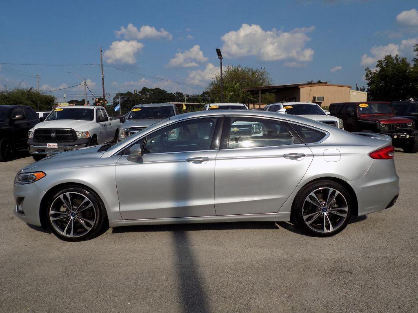 2019 SILVER FORD FUSION TITANIUM (3FA6P0D93KR) with an 2.0L engine, Automatic transmission, located at 830 E. Canino Rd., Houston, TX, 77037, (281) 405-0440, 38.358219, -81.729942 - Photo#2