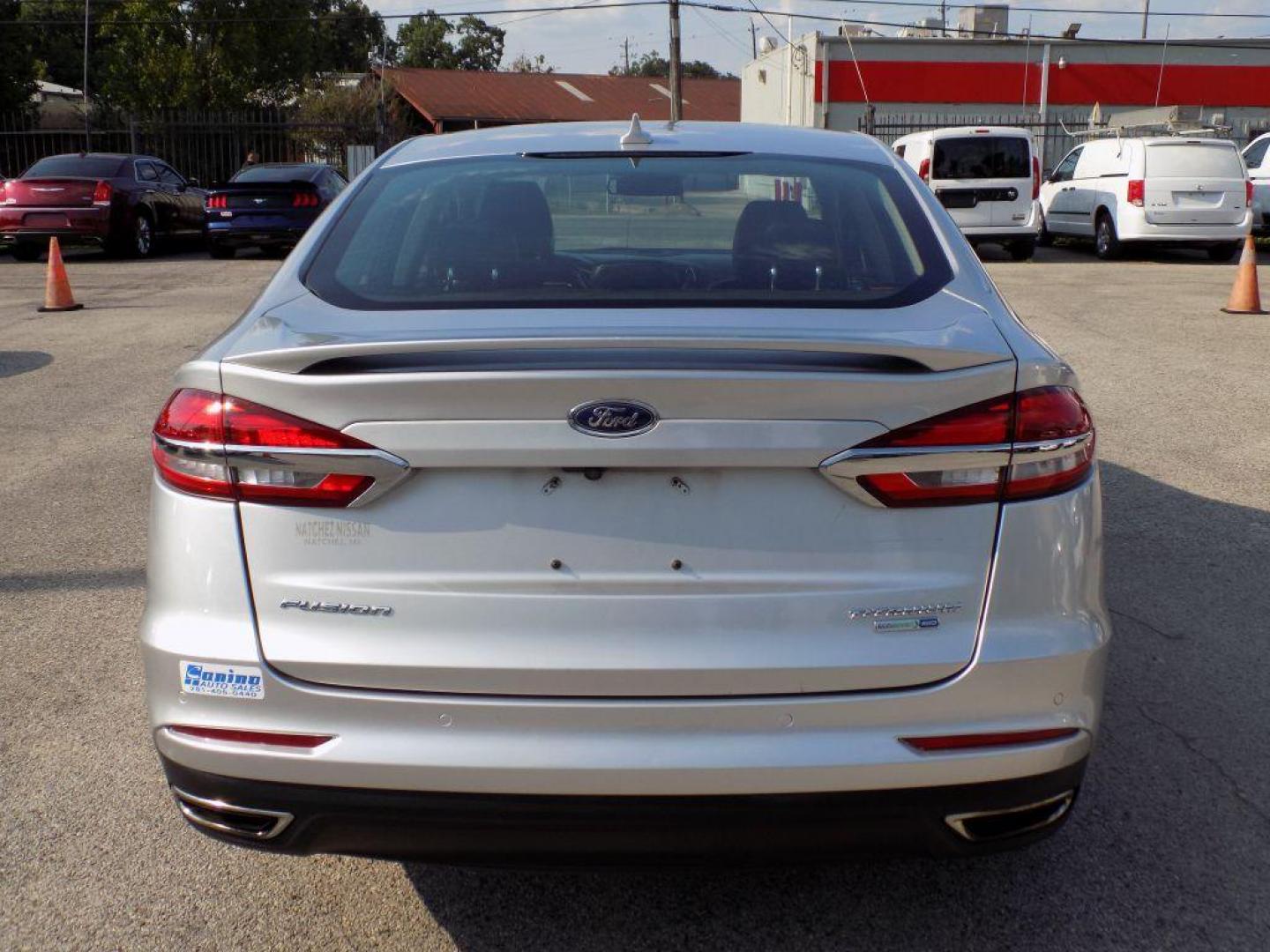 2019 SILVER FORD FUSION TITANIUM (3FA6P0D93KR) with an 2.0L engine, Automatic transmission, located at 830 E. Canino Rd., Houston, TX, 77037, (281) 405-0440, 38.358219, -81.729942 - Photo#4