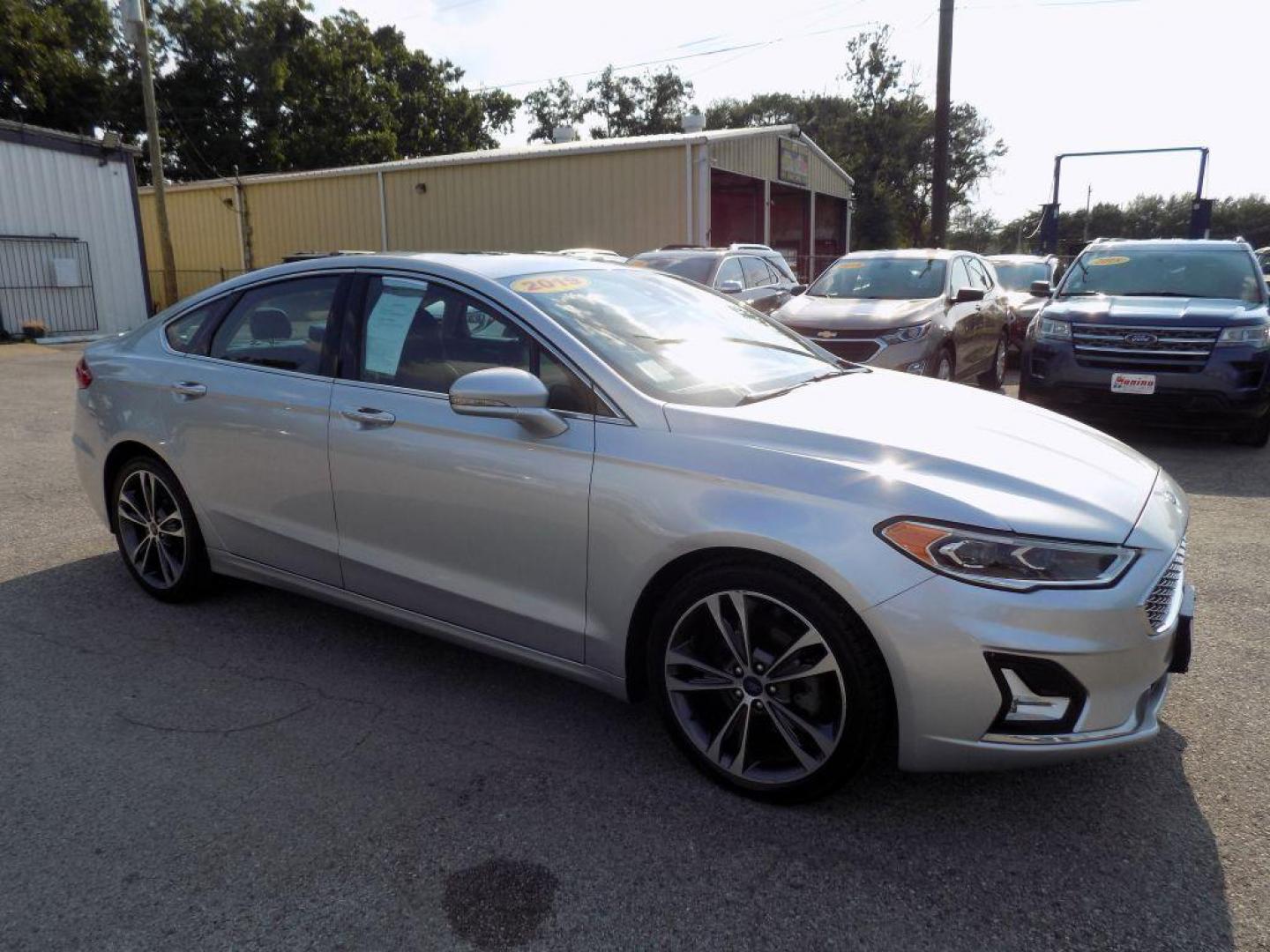 2019 SILVER FORD FUSION TITANIUM (3FA6P0D93KR) with an 2.0L engine, Automatic transmission, located at 830 E. Canino Rd., Houston, TX, 77037, (281) 405-0440, 38.358219, -81.729942 - Photo#7