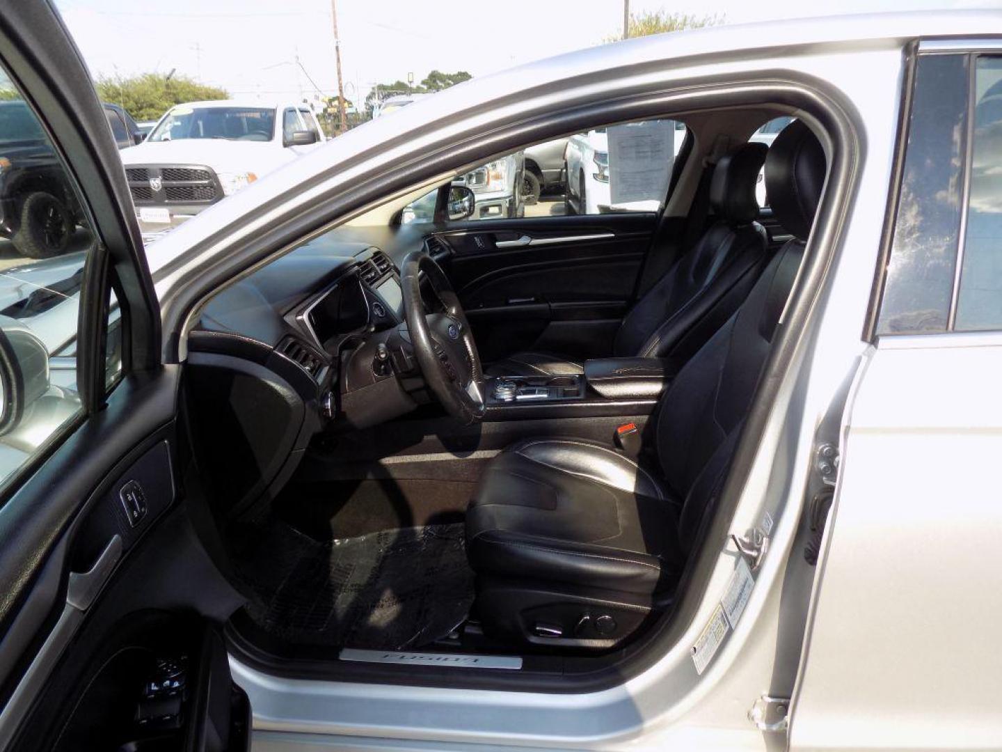 2019 SILVER FORD FUSION TITANIUM (3FA6P0D93KR) with an 2.0L engine, Automatic transmission, located at 830 E. Canino Rd., Houston, TX, 77037, (281) 405-0440, 38.358219, -81.729942 - Photo#9