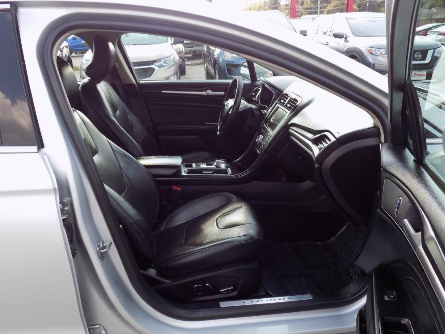 2019 SILVER FORD FUSION TITANIUM (3FA6P0D93KR) with an 2.0L engine, Automatic transmission, located at 830 E. Canino Rd., Houston, TX, 77037, (281) 405-0440, 38.358219, -81.729942 - Photo#18