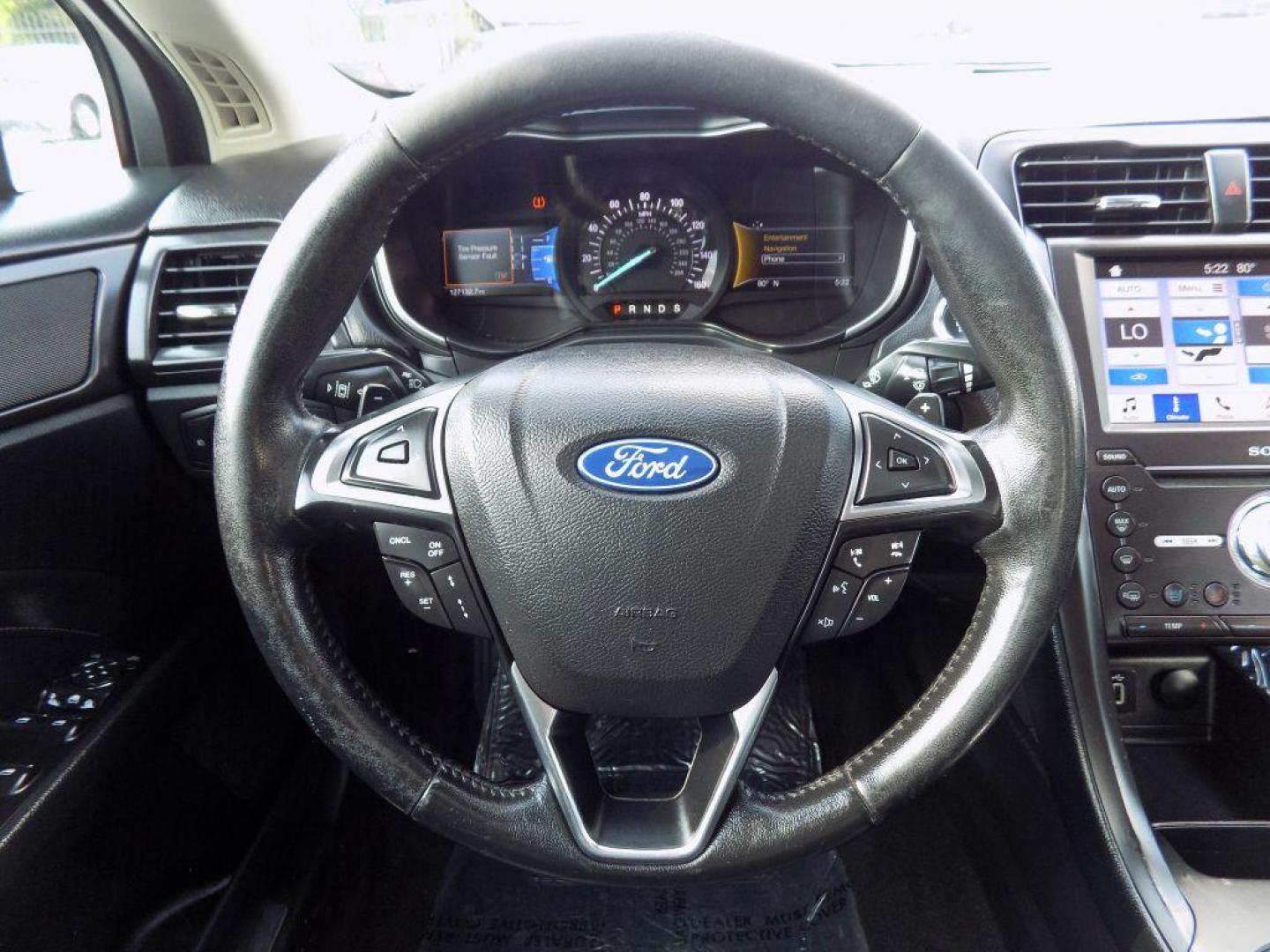 2019 SILVER FORD FUSION TITANIUM (3FA6P0D93KR) with an 2.0L engine, Automatic transmission, located at 830 E. Canino Rd., Houston, TX, 77037, (281) 405-0440, 38.358219, -81.729942 - Photo#25