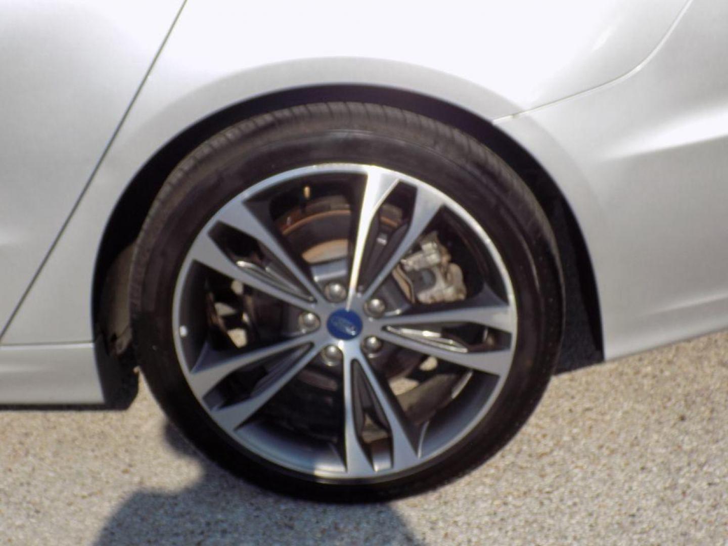 2019 SILVER FORD FUSION TITANIUM (3FA6P0D93KR) with an 2.0L engine, Automatic transmission, located at 830 E. Canino Rd., Houston, TX, 77037, (281) 405-0440, 38.358219, -81.729942 - Photo#28
