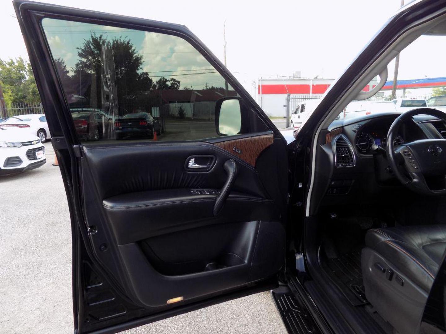 2018 BLACK NISSAN ARMADA SV (JN8AY2ND9JX) with an 5.6L engine, Automatic transmission, located at 830 E. Canino Rd., Houston, TX, 77037, (281) 405-0440, 38.358219, -81.729942 - Photo#8