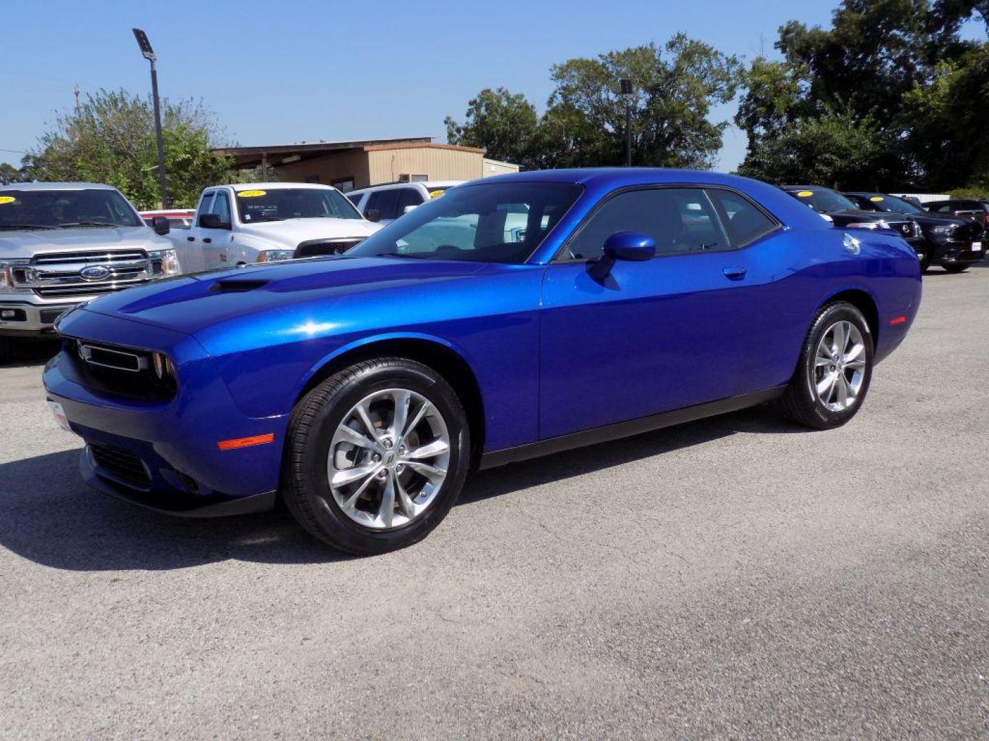 2022 BLUE DODGE CHALLENGER SXT (2C3CDZGG9NH) with an 3.6L engine, Automatic transmission, located at 830 E. Canino Rd., Houston, TX, 77037, (281) 405-0440, 38.358219, -81.729942 - Photo#1