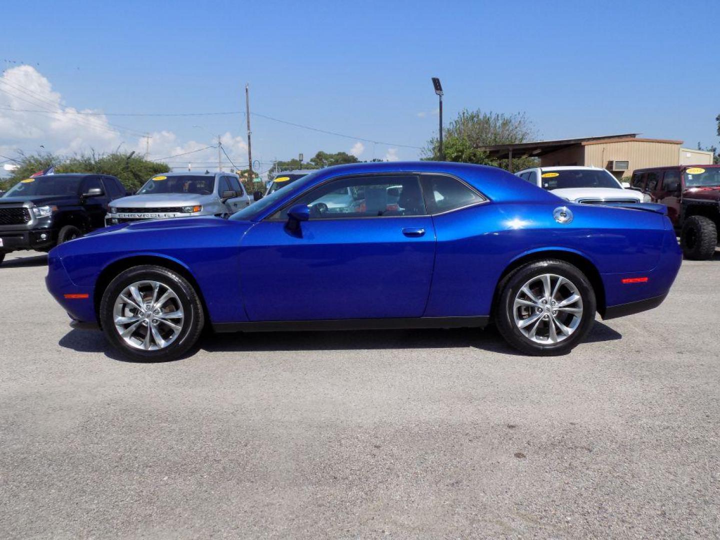 2022 BLUE DODGE CHALLENGER SXT (2C3CDZGG9NH) with an 3.6L engine, Automatic transmission, located at 830 E. Canino Rd., Houston, TX, 77037, (281) 405-0440, 38.358219, -81.729942 - Photo#2