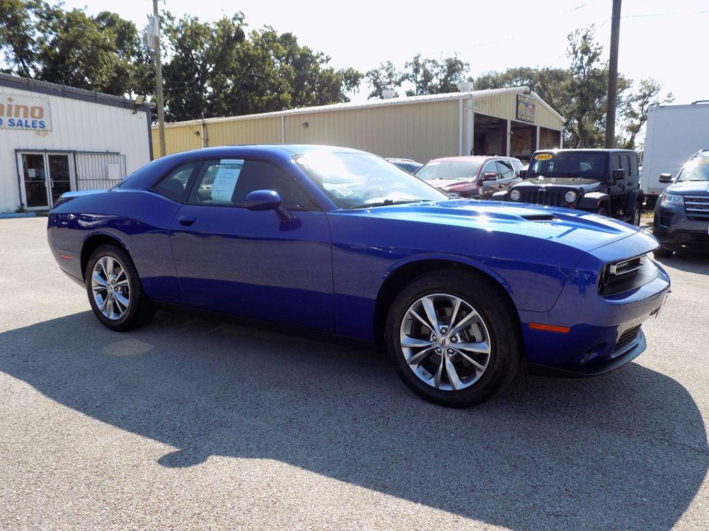 2022 BLUE DODGE CHALLENGER SXT (2C3CDZGG9NH) with an 3.6L engine, Automatic transmission, located at 830 E. Canino Rd., Houston, TX, 77037, (281) 405-0440, 38.358219, -81.729942 - Photo#7