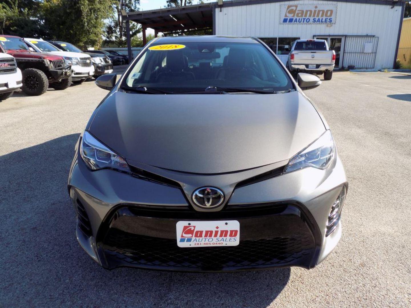 2018 GRAY TOYOTA COROLLA L (5YFBURHE2JP) with an 1.8L engine, Continuously Variable transmission, located at 830 E. Canino Rd., Houston, TX, 77037, (281) 405-0440, 38.358219, -81.729942 - Photo#0
