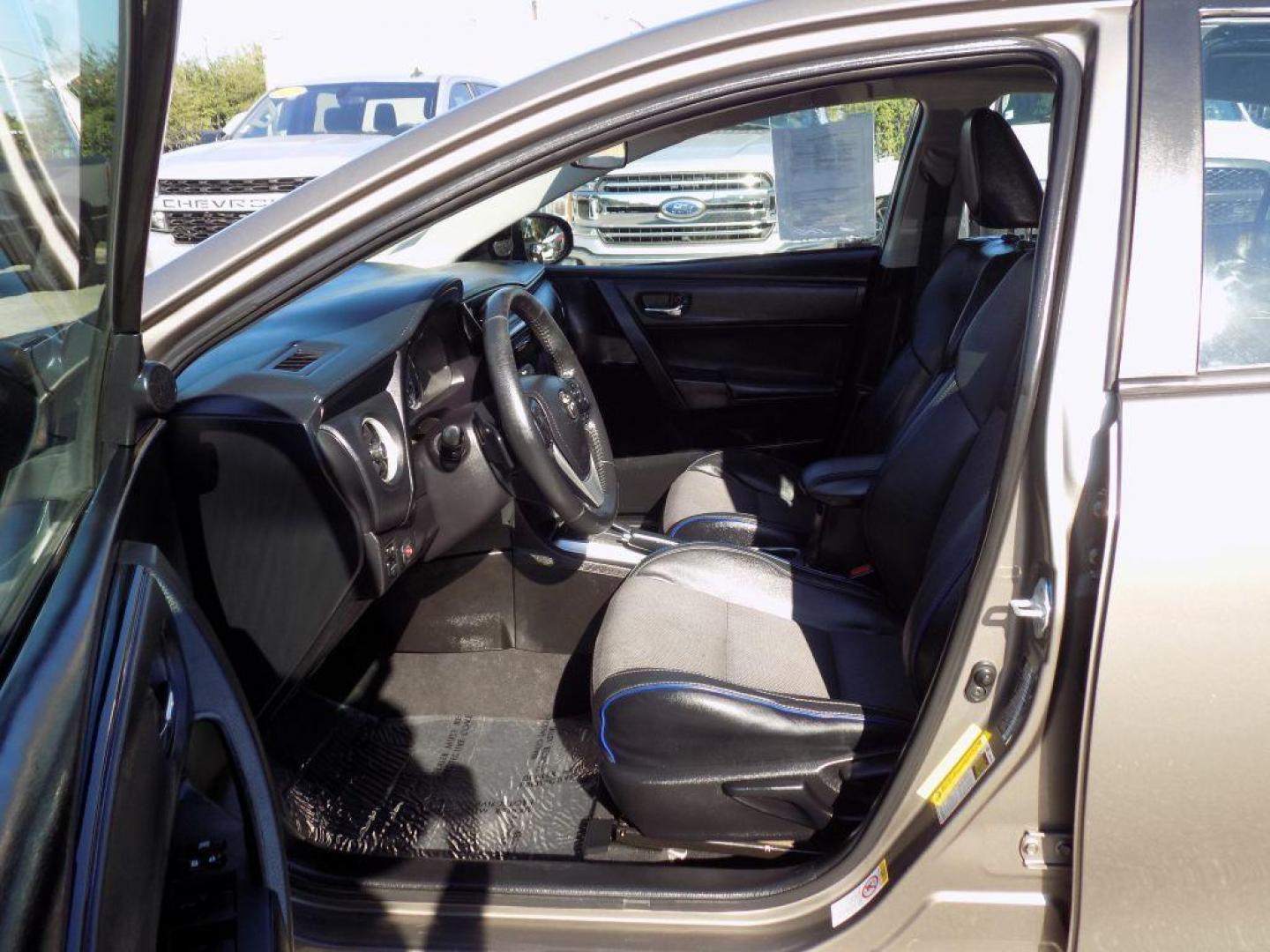 2018 GRAY TOYOTA COROLLA L (5YFBURHE2JP) with an 1.8L engine, Continuously Variable transmission, located at 830 E. Canino Rd., Houston, TX, 77037, (281) 405-0440, 38.358219, -81.729942 - Photo#9