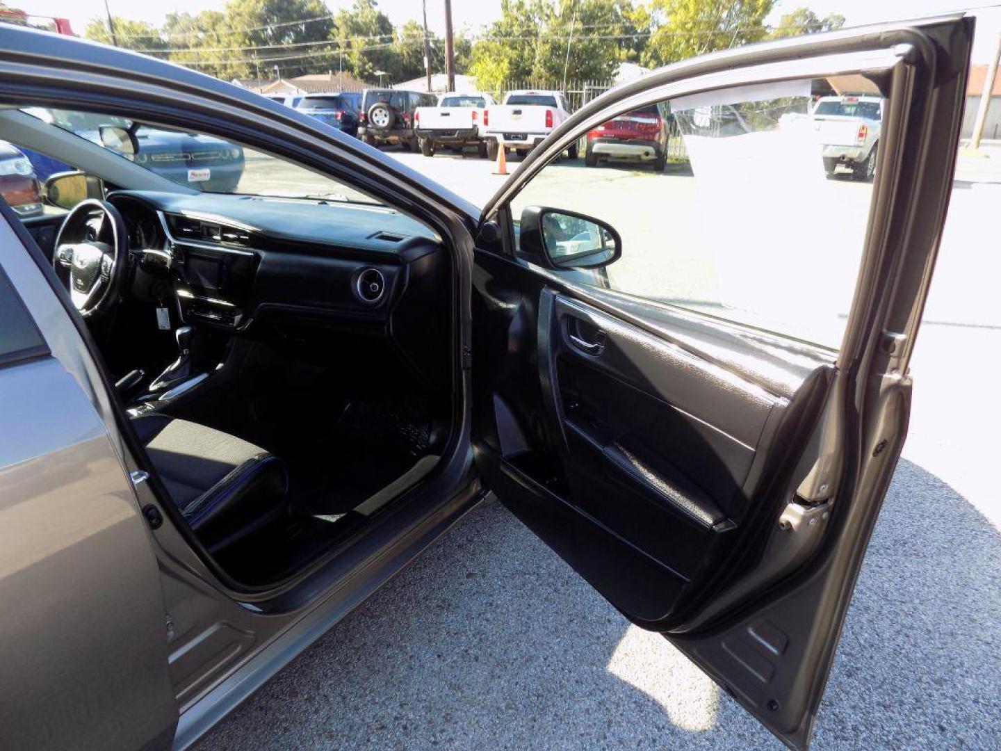 2018 GRAY TOYOTA COROLLA L (5YFBURHE2JP) with an 1.8L engine, Continuously Variable transmission, located at 830 E. Canino Rd., Houston, TX, 77037, (281) 405-0440, 38.358219, -81.729942 - Photo#10