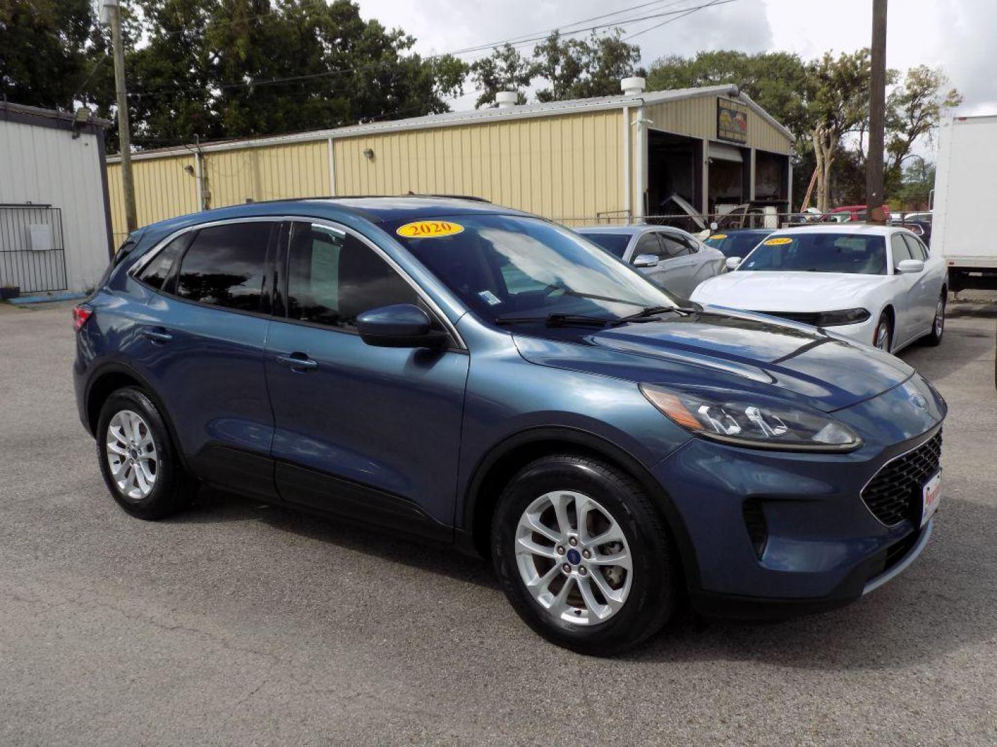 2020 BLUE FORD ESCAPE SE (1FMCU0G60LU) with an 1.5L engine, Automatic transmission, located at 830 E. Canino Rd., Houston, TX, 77037, (281) 405-0440, 38.358219, -81.729942 - Photo#7