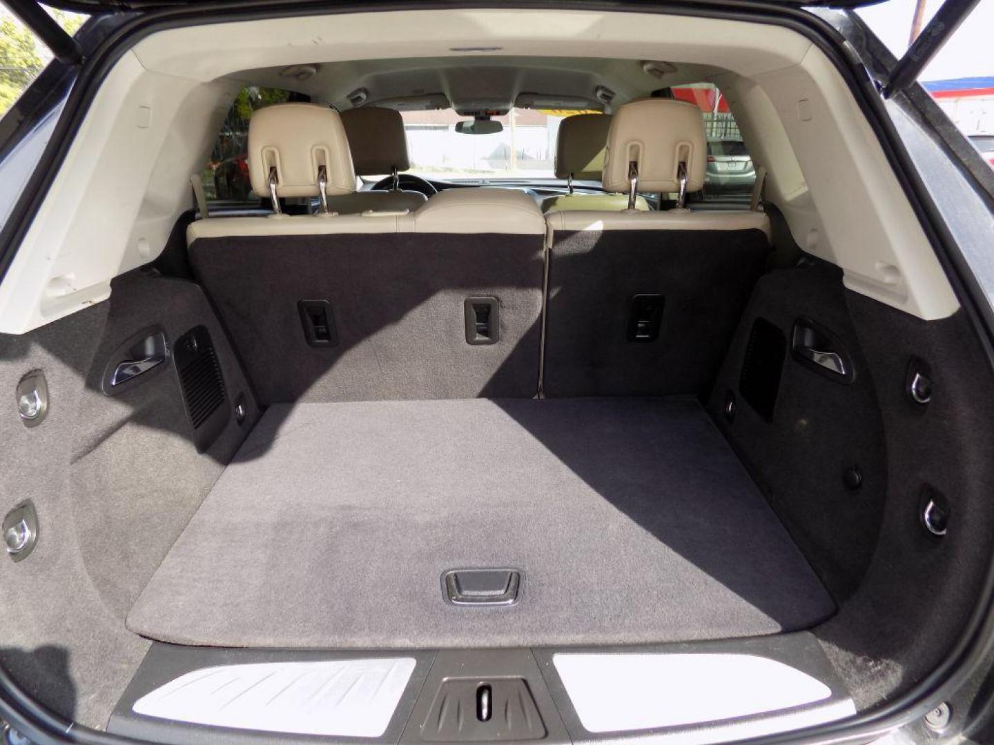 2020 BLACK BUICK ENVISION PREFERRED (LRBFXBSA9LD) with an 2.5L engine, Automatic transmission, located at 830 E. Canino Rd., Houston, TX, 77037, (281) 405-0440, 38.358219, -81.729942 - Photo#17