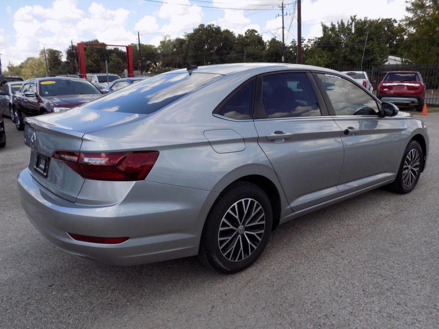 2021 SILVER VOLKSWAGEN JETTA S (3VWC57BU5MM) with an 1.4L engine, Automatic transmission, located at 830 E. Canino Rd., Houston, TX, 77037, (281) 405-0440, 38.358219, -81.729942 - Photo#5
